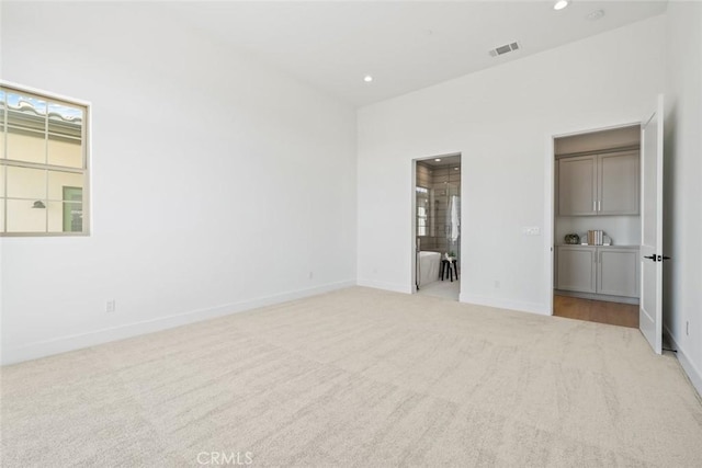 4140 Hillside Dr, San Luis Obispo, CA 93401 - unfurnished bedroom with carpet floors, baseboards, recessed lighting, and ensuite bath
