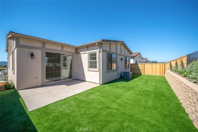 4140 Hillside Dr, San Luis Obispo, CA 93401 - rear view of house with stucco siding, central AC unit, and a patio area