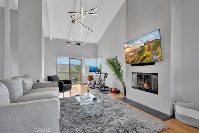 120 Avenida Santa Margarita, San Clemente, CA 92672 - living room with high vaulted ceiling, a fireplace with flush hearth, wood finished floors, and beam ceiling