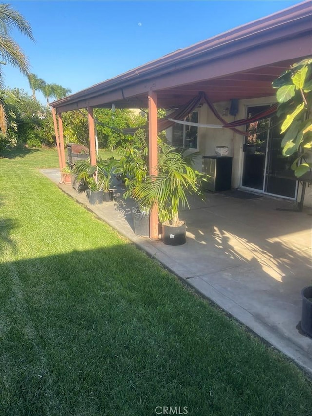 5683 Green Pasture Rd, Jurupa Valley, CA 92509 - view of green lawn featuring a patio