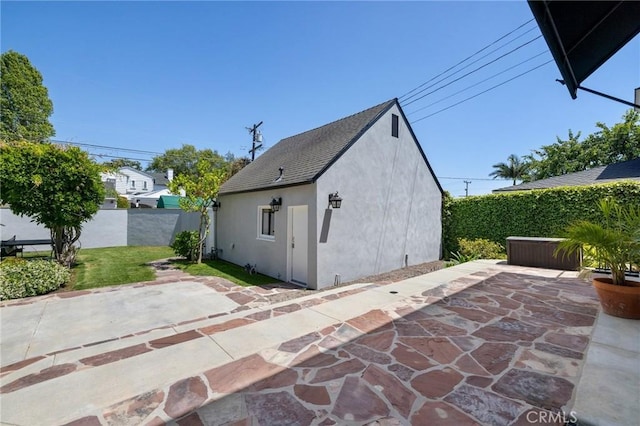 426 Ultimo Ave, Long Beach, CA 90814 - rear view of house featuring stucco siding, fence, and a patio area