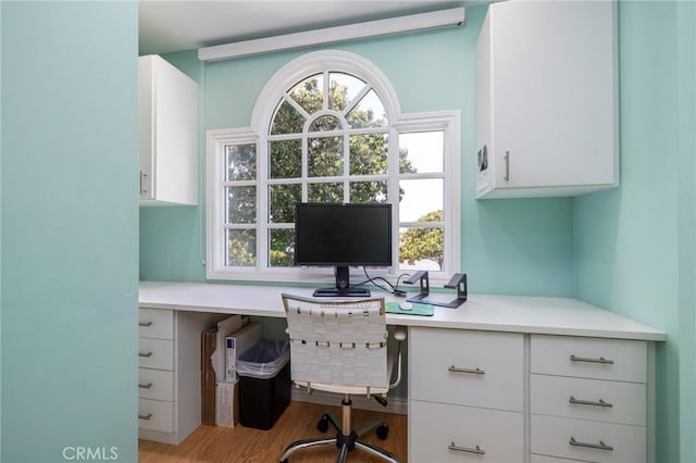 426 Ultimo Ave, Long Beach, CA 90814 - office area featuring built in desk, healthy amount of natural light, and light wood-style floors