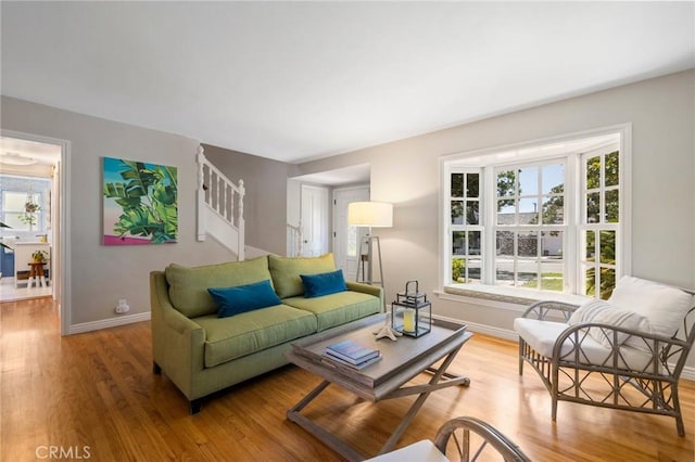 426 Ultimo Ave, Long Beach, CA 90814 - living area with light wood-style flooring and baseboards