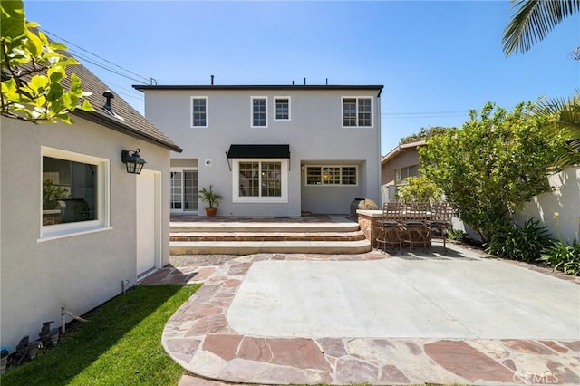 426 Ultimo Ave, Long Beach, CA 90814 - back of house with a patio, stucco siding, and fence