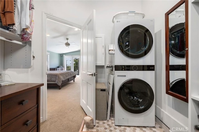 426 Ultimo Ave, Long Beach, CA 90814 - laundry area featuring stacked washer and clothes dryer, ceiling fan, and light colored carpet