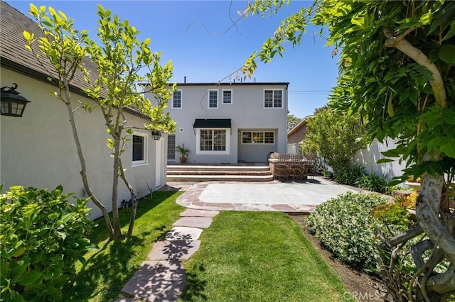 426 Ultimo Ave, Long Beach, CA 90814 - back of house featuring stucco siding, a patio area, and a wooden deck