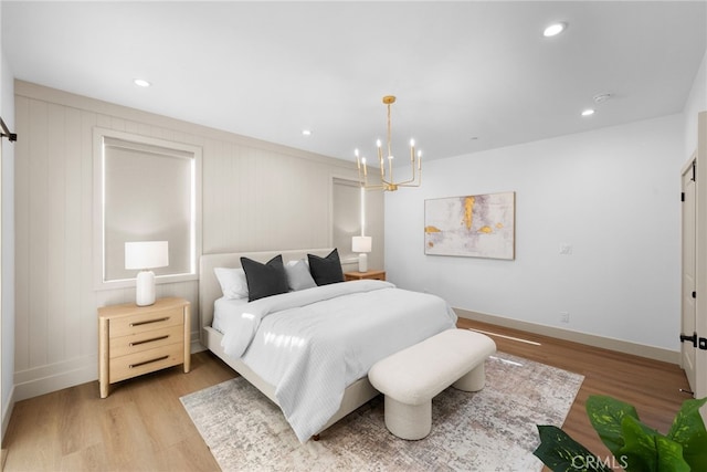 16225 Orizaba Ave, Paramount, CA 90723 - bedroom featuring light wood-type flooring, a chandelier, baseboards, and recessed lighting