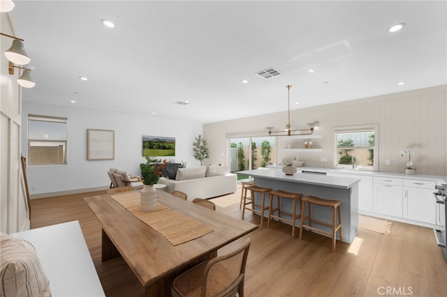 16225 Orizaba Ave, Paramount, CA 90723 - dining room with plenty of natural light, light wood-type flooring, and recessed lighting