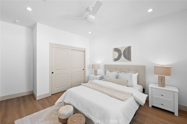 16225 Orizaba Ave, Paramount, CA 90723 - bedroom with wood finished floors, baseboards, a closet, and recessed lighting