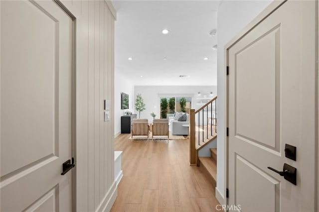16225 Orizaba Ave, Paramount, CA 90723 - corridor with light wood-style flooring, recessed lighting, stairs, and baseboards