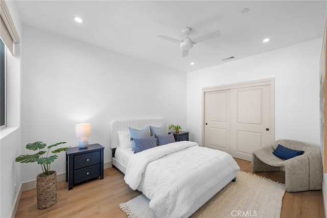 16225 Orizaba Ave, Paramount, CA 90723 - bedroom with light wood-type flooring, a closet, recessed lighting, ceiling fan, and baseboards