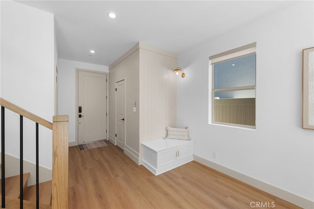 16225 Orizaba Ave, Paramount, CA 90723 - hallway featuring light wood-style flooring, stairway, recessed lighting, and baseboards
