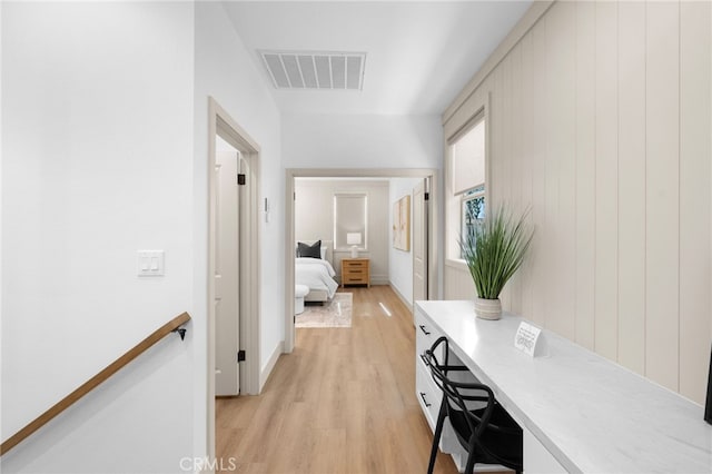 16225 Orizaba Ave, Paramount, CA 90723 - hall with light wood-type flooring and a desk