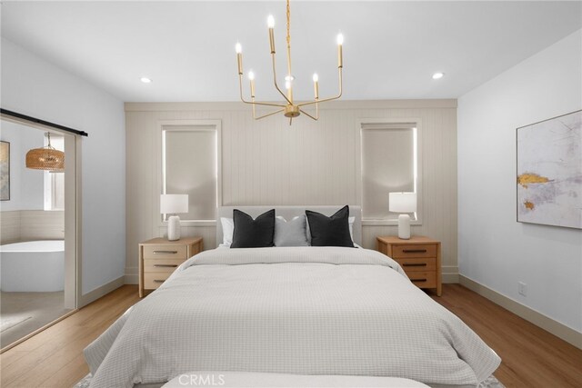 16225 Orizaba Ave, Paramount, CA 90723 - bedroom with a chandelier, baseboards, light wood-style flooring, and recessed lighting