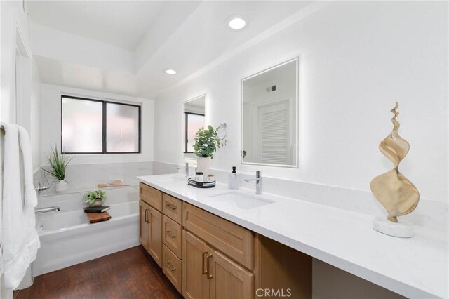1327 Solera Ln Unit 6, Diamond Bar, CA 91765 - full bath with a bath, double vanity, wood finished floors, and recessed lighting