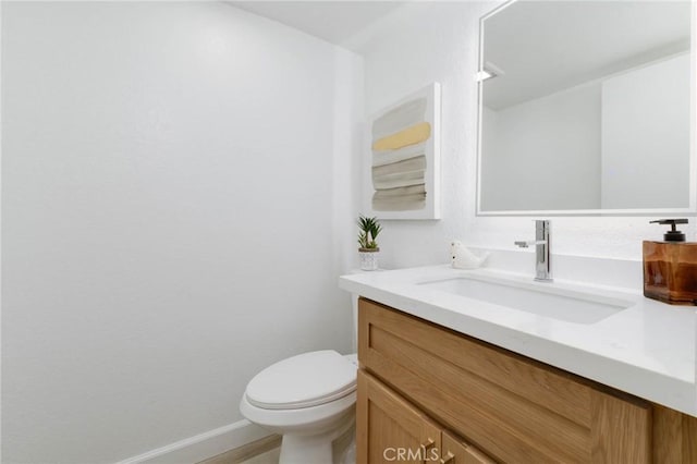 1327 Solera Ln Unit 6, Diamond Bar, CA 91765 - bathroom featuring vanity, toilet, and baseboards