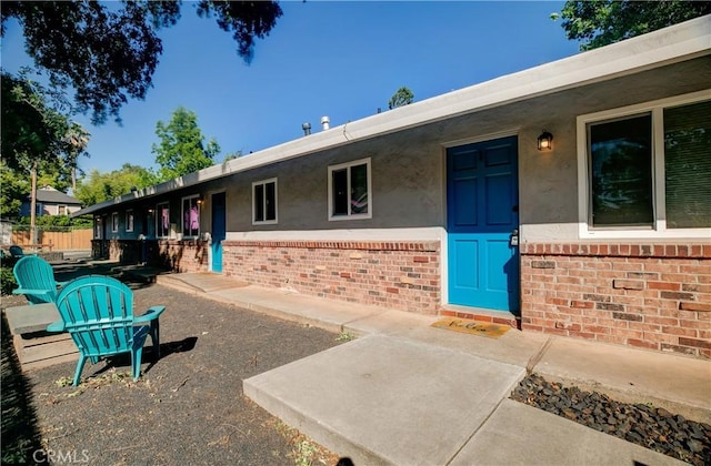 1905 Normal Ave, Chico, CA 95928 - property entrance with brick siding and stucco siding