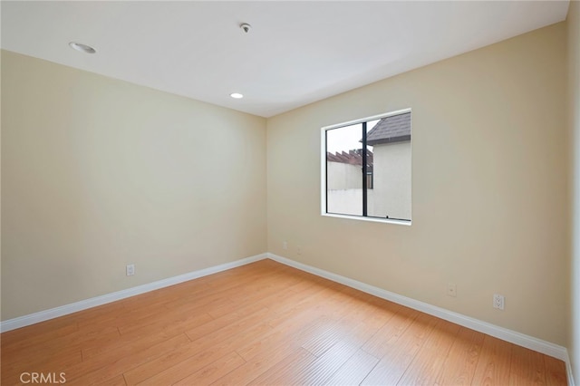 1161 Spazier Ave Unit 4, Glendale, CA 91201 - empty room with baseboards, light wood-type flooring, and recessed lighting