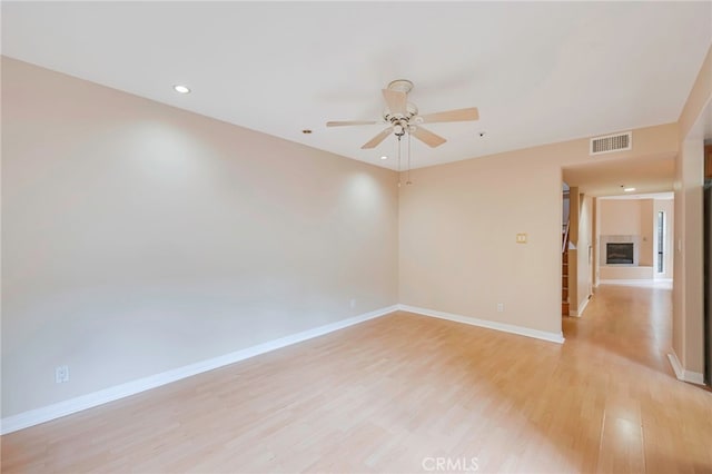 1161 Spazier Ave Unit 4, Glendale, CA 91201 - spare room featuring ceiling fan, light wood-style flooring, baseboards, and recessed lighting