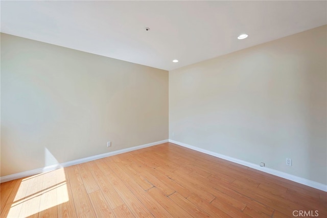 1161 Spazier Ave Unit 4, Glendale, CA 91201 - unfurnished room featuring baseboards, light wood-style flooring, and recessed lighting