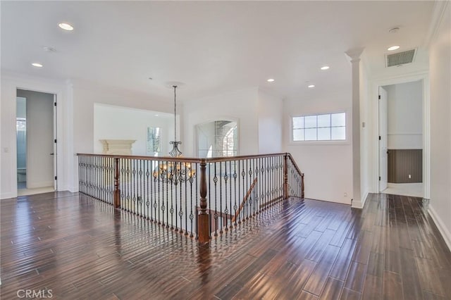 12932 Carnesi Dr, Rancho Cucamonga, CA 91739 - hall with a chandelier, an upstairs landing, wood finished floors, baseboards, and recessed lighting