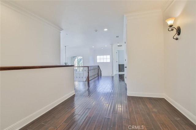 12932 Carnesi Dr, Rancho Cucamonga, CA 91739 - hall with dark wood-style floors, baseboards, ornamental molding, recessed lighting, and an upstairs landing