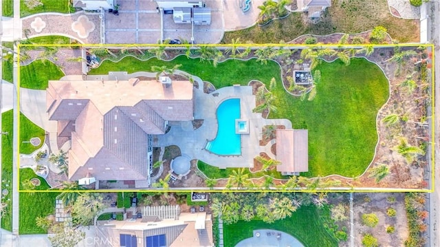 12932 Carnesi Dr, Rancho Cucamonga, CA 91739 - aerial view of property and surrounding area with a pool and property parcel outlined
