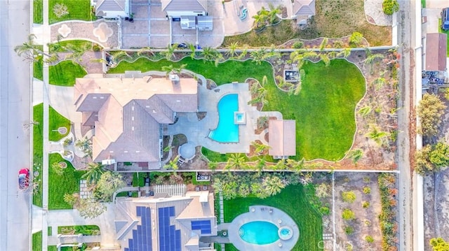 12932 Carnesi Dr, Rancho Cucamonga, CA 91739 - aerial view of property and surrounding area with a pool and property boundaries highlighted