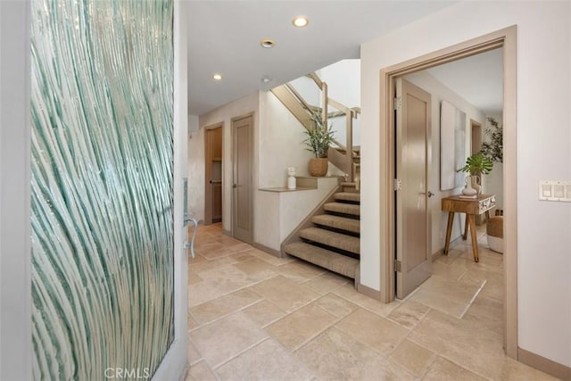 1907 Ocean Way, Laguna Beach, CA 92651 - hallway featuring stairway, stone tile flooring, baseboards, and recessed lighting