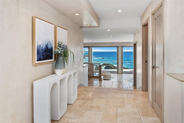 1907 Ocean Way, Laguna Beach, CA 92651 - hall with stone tile floors, recessed lighting, and a water view
