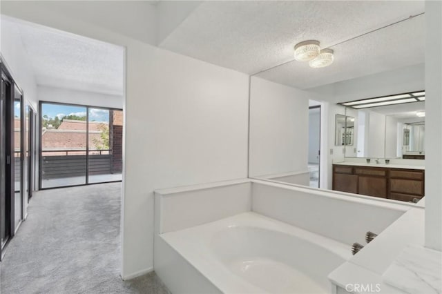4515 Alla Rd Unit 2, Marina Del Rey, CA 90292 - full bath with a textured ceiling, a bath, and vanity
