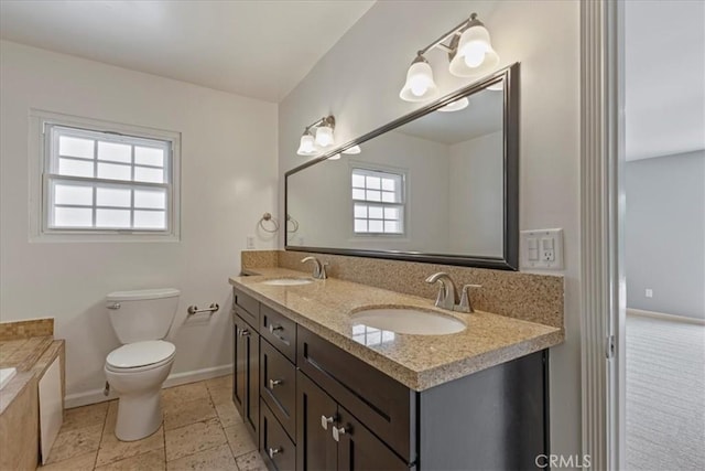 1924 N Evergreen St, Burbank, CA 91505 - full bathroom with toilet, baseboards, double vanity, and a bathtub