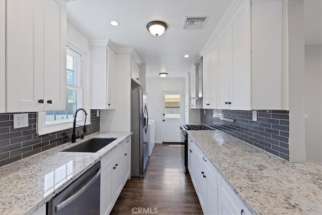 1924 N Evergreen St, Burbank, CA 91505 - kitchen with a sink, stainless steel appliances, dark wood-style flooring, plenty of natural light, and recessed lighting