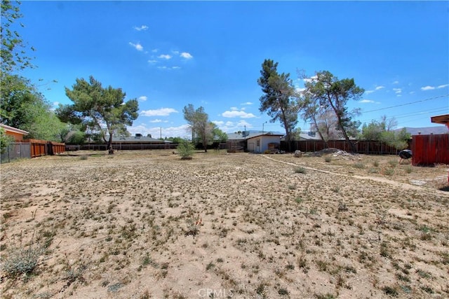 view of yard with fence