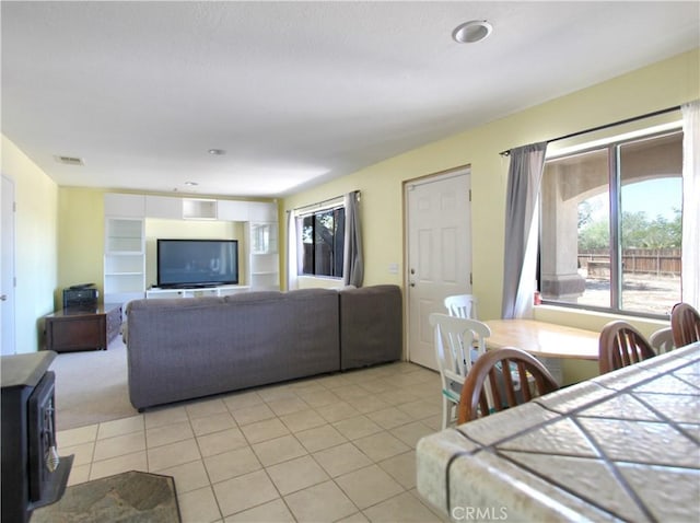 living room with light tile patterned flooring