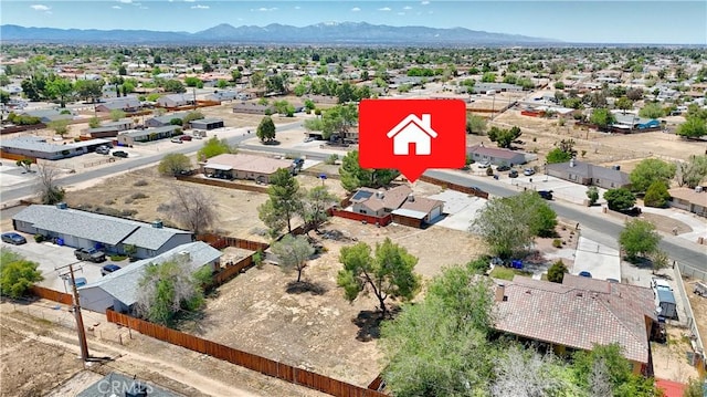aerial view of residential area with mountains