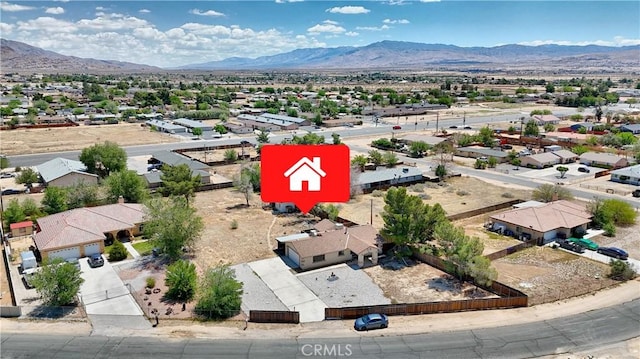 aerial view of residential area with a mountainous background