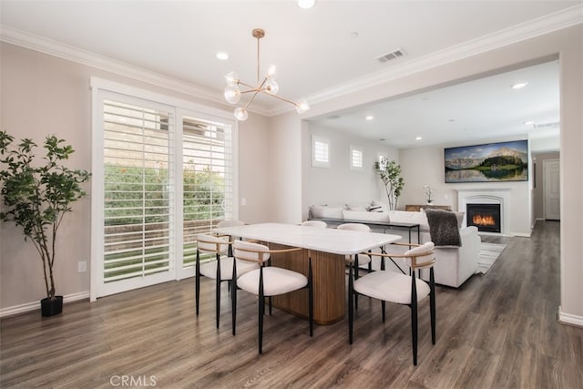 29048 N W Hills Dr, Valencia, CA 91354 - dining room with dark wood finished floors, crown molding, a chandelier, a warm lit fireplace, and recessed lighting
