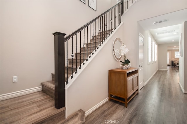 29048 N W Hills Dr, Valencia, CA 91354 - stairs with wood finished floors and a high ceiling