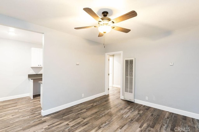 4401 La Clede Ave, Los Angeles, CA 90039 - unfurnished room featuring wood finished floors, ceiling fan, baseboards, and a heating unit