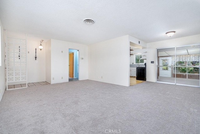 43451 Briercliff Dr, Hemet, CA 92544 - unfurnished living room with carpet and a textured ceiling