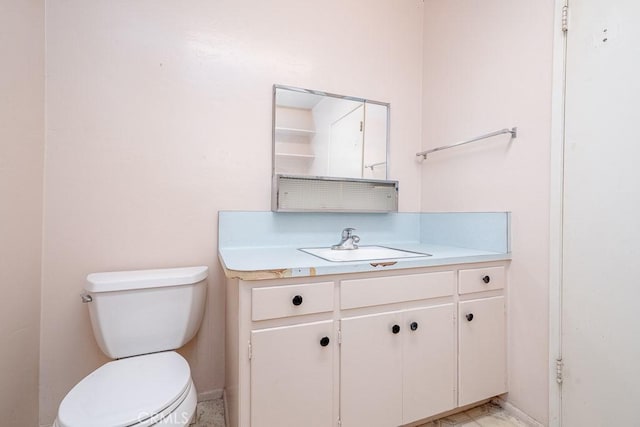 43451 Briercliff Dr, Hemet, CA 92544 - bathroom with toilet, vanity, and baseboards