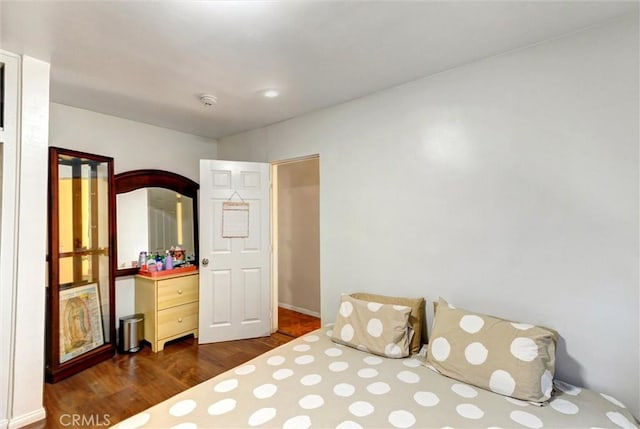 5864 Bonsallo Ave, Los Angeles, CA 90044 - bedroom featuring dark wood-style floors and baseboards