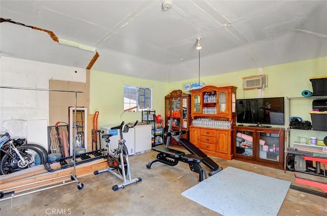 5864 Bonsallo Ave, Los Angeles, CA 90044 - exercise room with a wall mounted AC