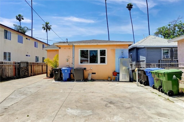 5864 Bonsallo Ave, Los Angeles, CA 90044 - view of front of home featuring stucco siding and a patio