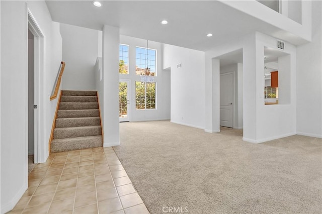 4064 Lemonberry Pl, Thousand Oaks, CA 91362 - unfurnished living room with light carpet, recessed lighting, baseboards, stairs, and light tile patterned floors