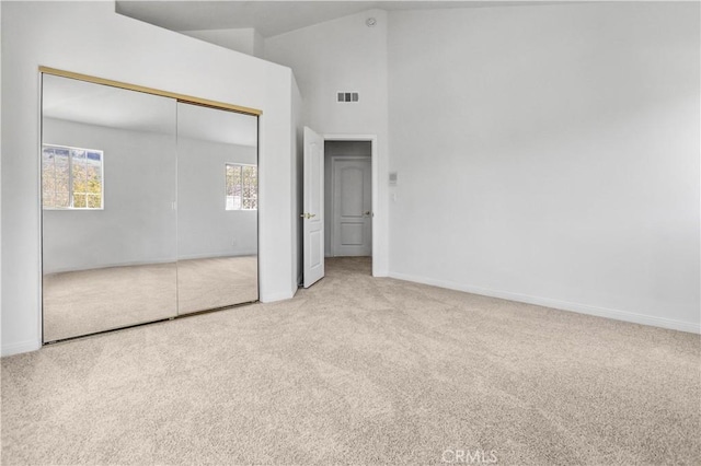 4064 Lemonberry Pl, Thousand Oaks, CA 91362 - unfurnished bedroom featuring carpet, a closet, baseboards, and high vaulted ceiling