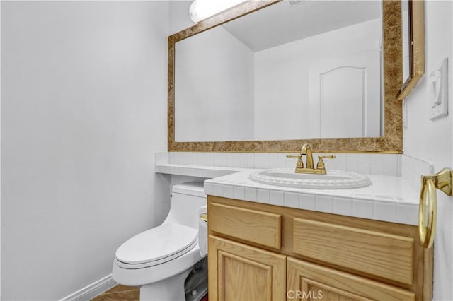 4064 Lemonberry Pl, Thousand Oaks, CA 91362 - half bathroom featuring toilet, vanity, and baseboards