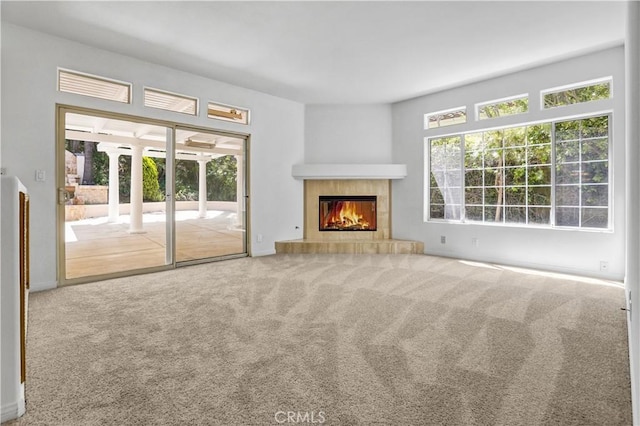4064 Lemonberry Pl, Thousand Oaks, CA 91362 - unfurnished living room with a tile fireplace and carpet