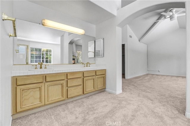 4064 Lemonberry Pl, Thousand Oaks, CA 91362 - bathroom featuring carpet flooring, a ceiling fan, double vanity, baseboards, and vaulted ceiling